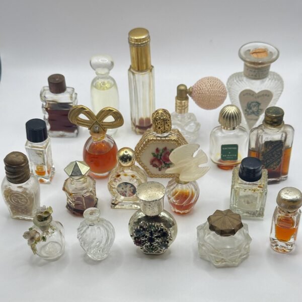 A Display of 20 Mini Vintage Perfume Bottles